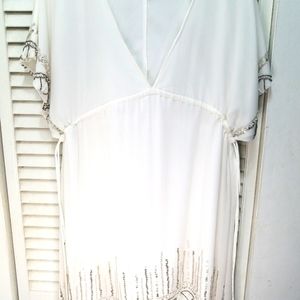 Off white sequins trim dress  20 inches across the chest